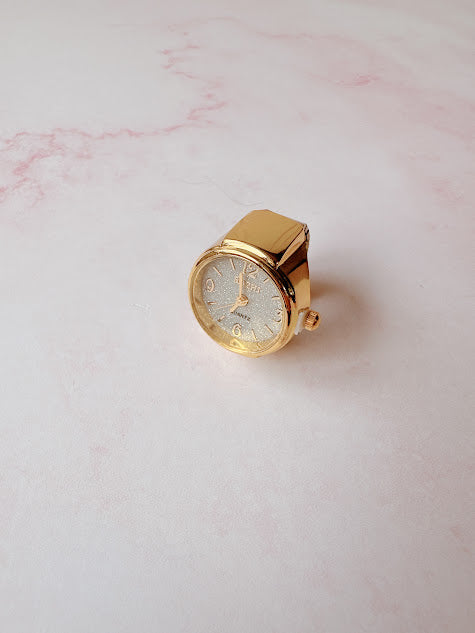 Anillo Reloj eterno glam dorado