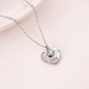 Mini dije de corazón plateado