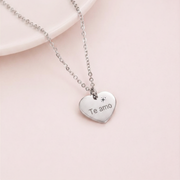 Mini dije de corazón plateado
