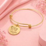 Pulsera dorada con dije colgante