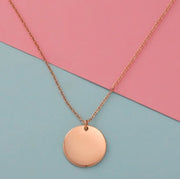 Collar plaquita redonda oro rosa 2cm