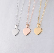 Dije de corazón plateado